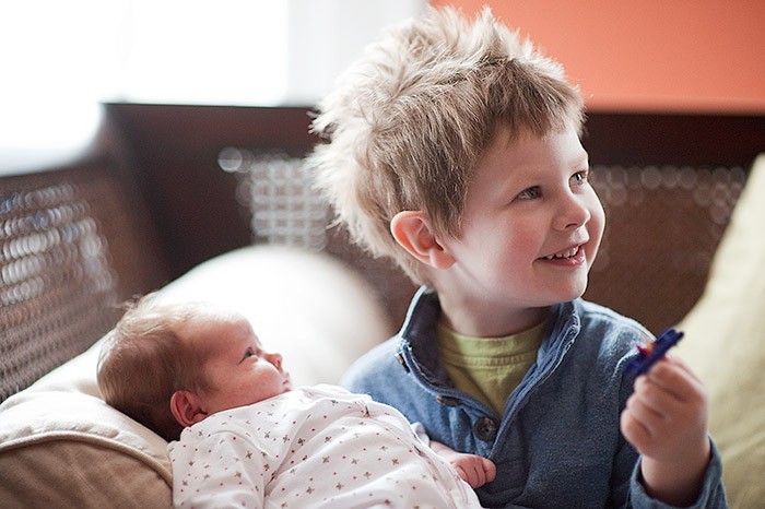 holding his sister